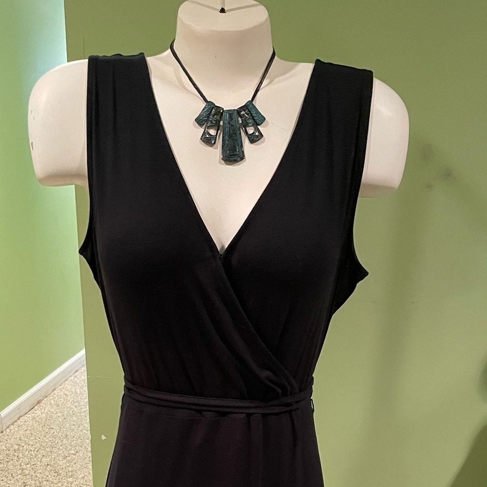 Banana Republic Black wrap dress. Size Medium, never worn. Length is to mid calf